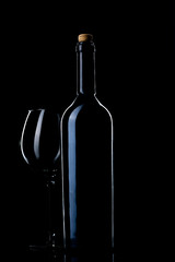 Bottle and glass of red wine