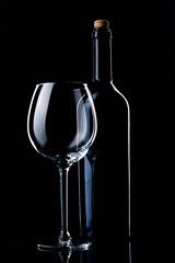 Bottle and glass of red wine