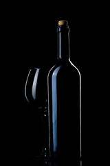 Bottle and glass of red wine