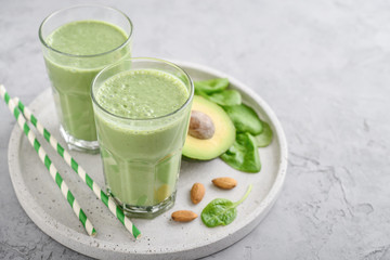 Green smoothie with spinach or avocado