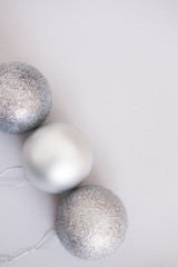 White silver Christmas balls background