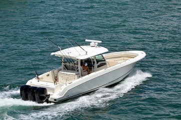 High-end sport fishing boat with enclosed cockpit