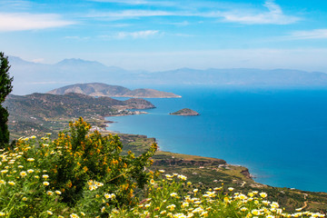 Beautiful view of the Mirabello bay. Near to Sitia and Agios Nikolaos. Landscape with turquoise sea, mountains and green nature.