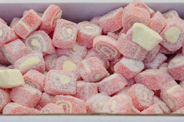 Heap of colorful turkish delight in a box, ready for serving