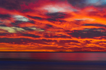 Fototapeta na wymiar Fire Red Sunset at Sunset Cliffs, San Diego
