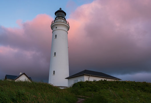 Historical Hirtshals lighthouse on the coast of Skagerrak at sunset, Denmark(Danmark). July 2019