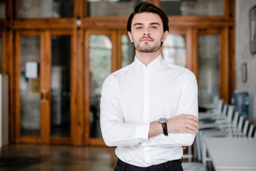 smart man in white shirt in the office