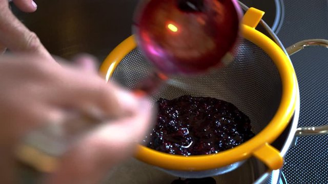 Homemade juice from Wild Blackberries-Squeezing - (4K)