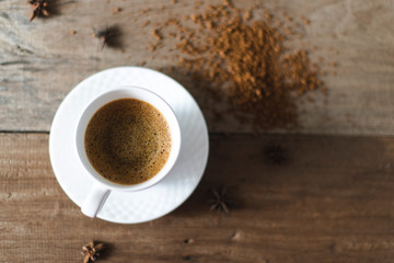 coffee cup served on table with coffee grinder