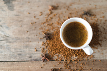 coffee cup served on table with coffee grinder