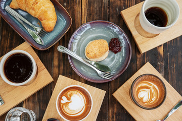 meeting with variety of coffee with cake