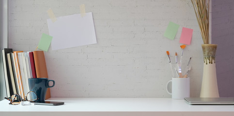 Creative artist studio with copy space and painting tools