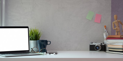 Trendy photographer's workplace with copy space