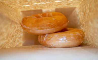 take away donut in the paper bag