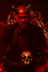 satan demon with skull