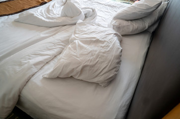 Fototapeta na wymiar Bed and pillows after sleepy night