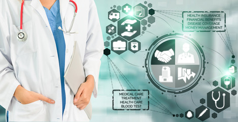 Health Insurance Concept - Doctor in hospital with health insurance related icon graphic interface...
