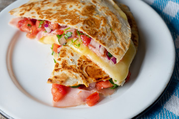 Mexican quesadillas with sliced ham also called 