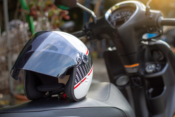 Obraz na płótnie Canvas Helmet isolated on motorbike. 