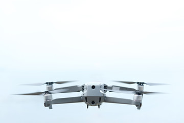 Aerial equipment Drone with Digital Camera on the White and blue Background .Technology concept
