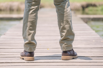 Model wearing sofe green color cargo pants or cargo trousers