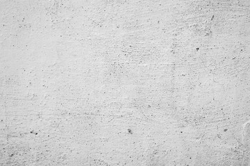 Texture of a concrete wall with cracks and scratches which can be used as a background