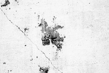 Texture of a concrete wall with cracks and scratches which can be used as a background