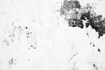 Texture of a concrete wall with cracks and scratches which can be used as a background