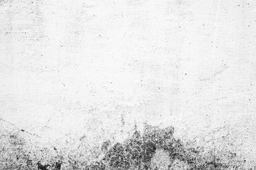 Texture of a concrete wall with cracks and scratches which can be used as a background