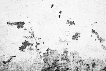 Texture of a concrete wall with cracks and scratches which can be used as a background