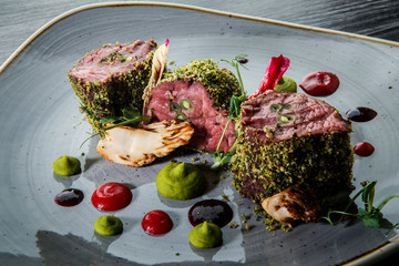 closeup exclusive decorated three raw baked meat pieces