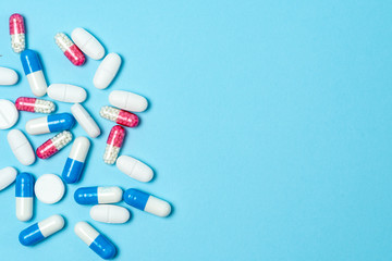 Studio shot of medical pills on blue background