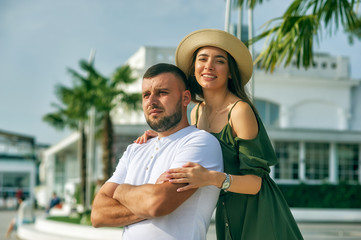 Young couple in love in the city . Romantic couple on the street of the resort town .