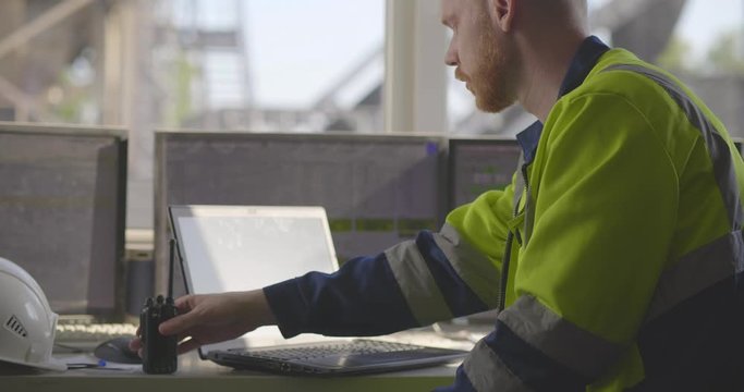 Industrial worker in control room