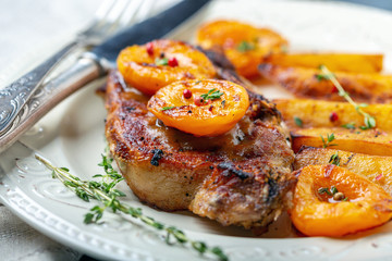 Entrecote of pork with apricots and thyme.