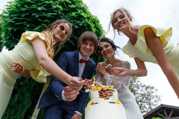 Newlyweds and bridesmaids have fun