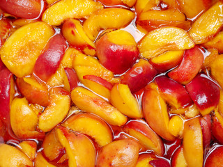 Fruit background. Peaches sliced for making jam. Food concept. Top view