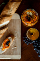 Tasty tomato baguette with white wine