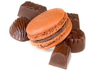 Cookies with chocolate candy  on a white background closeup.