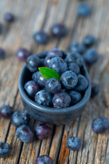 fresh blueberries in a black bowl