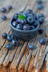 fresh blueberries in a black bowl