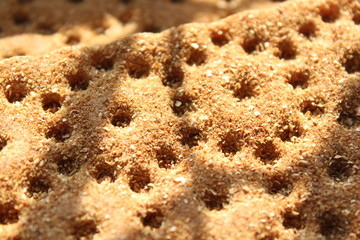 Crispbread with a beautiful pattern, background