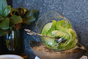 fresh vegetables salad in glass bowl on ice of breakfast buffet in the catering buffet food at hotel.