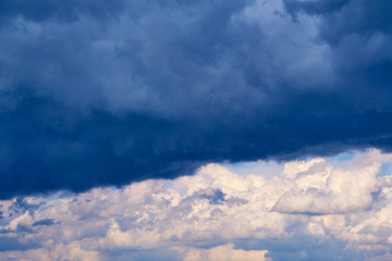 Clouds on the blue sky.