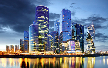 Plakat Skyscrapers of Moscow City business center and Moscow river in Moscow at night, Russia. Architecture and landmark of Moscow
