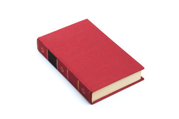 Closed red  book isolated on a white background