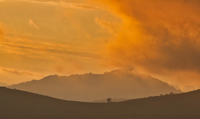 Magestic sunset in the carpatian mountains. Natural autumn landscape.
