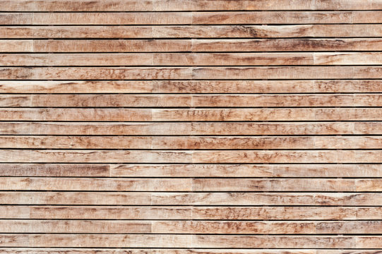 Texture formed by a wall of horizontal wooden slats.
