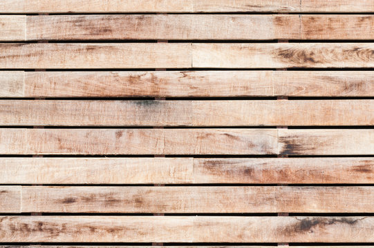 Texture formed by a wall of horizontal wooden slats.