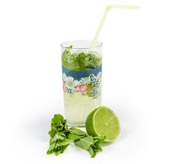 Mojito in glass, mint, lime on a white background